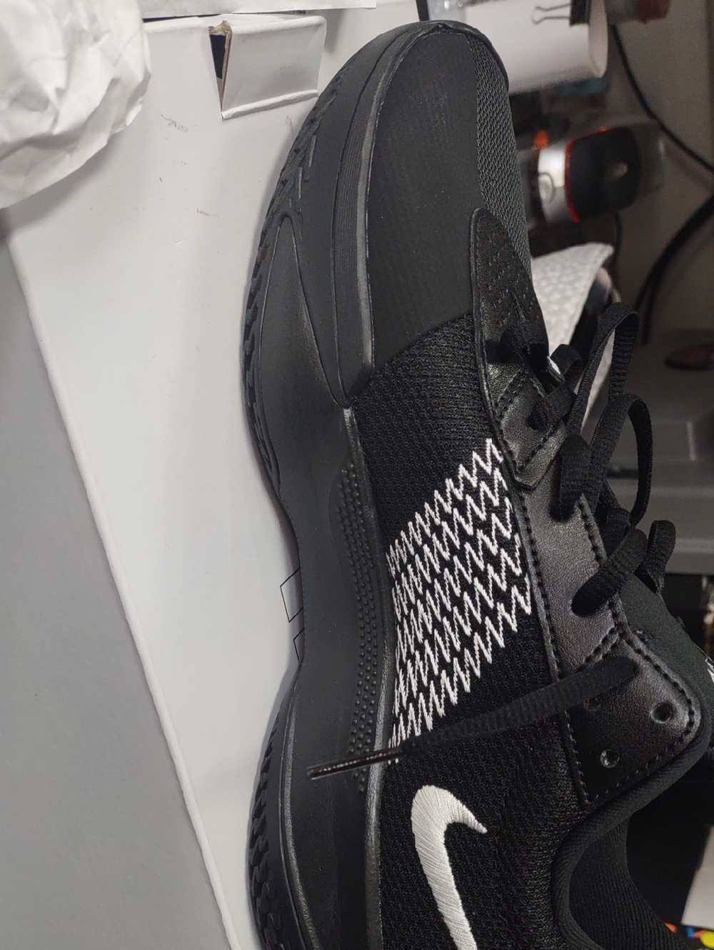 Nike Men’s Black Athletic Sneakers with White Swoosh and Knit Detail